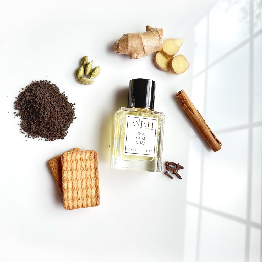 Photorealistic chai perfume by Anjali Perfumes – a cardamom and milk gourmand scent inspired by Indian masala chai.