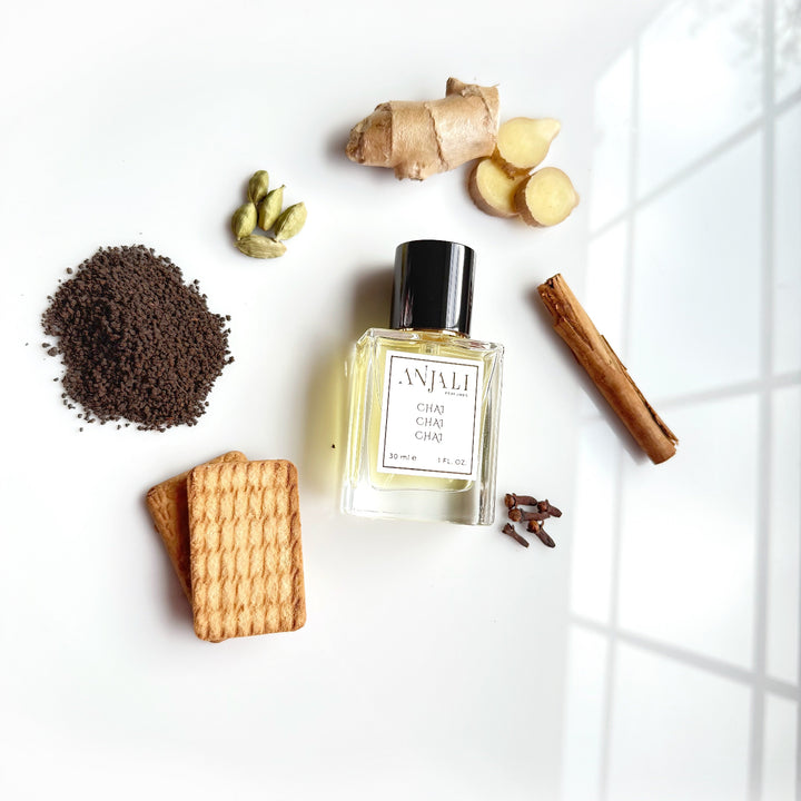 Photorealistic chai perfume by Anjali Perfumes – a cardamom and milk gourmand scent inspired by Indian masala chai.